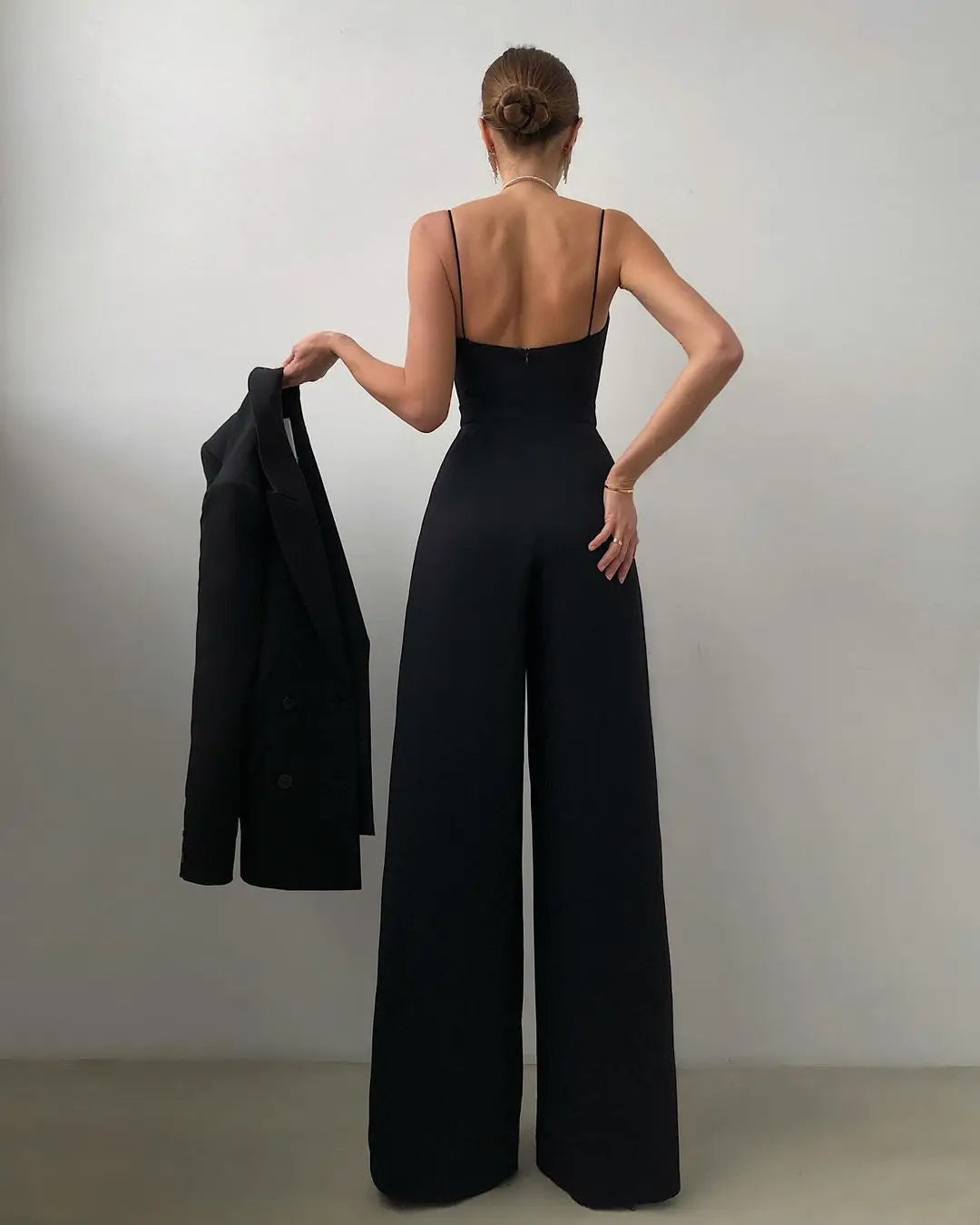 Penelope – Mouwloze Jumpsuit met Hoge Taille en Wijde Pijpen Dames